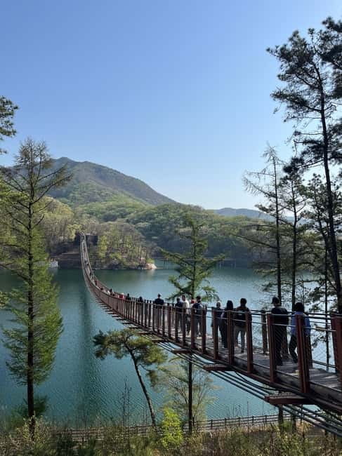 DMZ; NK Defector, 3rd Tunnel, Suspension Bridge,Hotel pickup - Dora Observatory and the view into North Korea