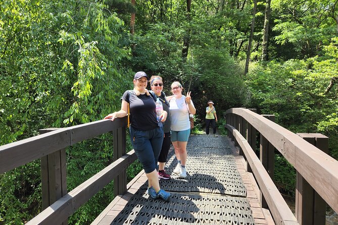Hike and Explore the Wonder of Bukhansan National Park with hiking professional(including Lunch) - Fortress walls and a Buddhist temple on the ridge