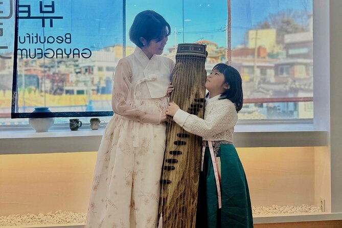 Play Gayageum in Hanbok Cultural Experience in Bukchon - A musical break in Bukchon