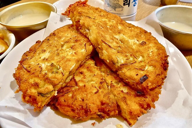 Private Downtown Seoul Food & Market Tour with 8+ Tastings - Fish fillets with a little soup