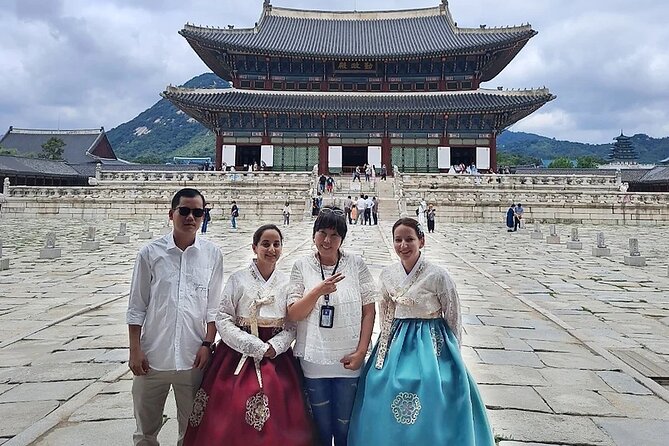 Private Seoul City Tour Palace, village, temple, market - Bukchon Hanok Village in traditional dress