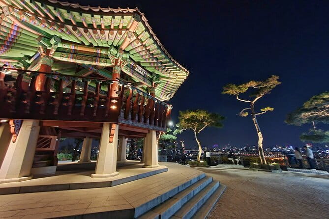 Seoul City Night View and Foodie Walking Tour - Naksan Park and the glowing fortress wall