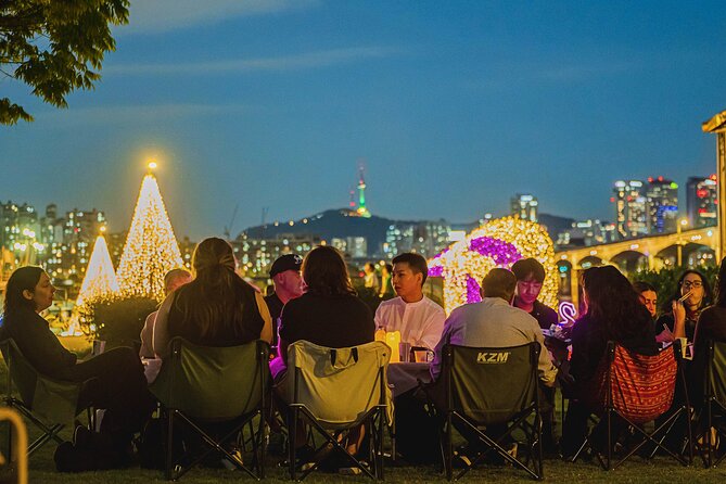 Seoul Han River Night Tour: Picnic, Games & Starlight Cruise - Yeouido Han River Park and the first walk