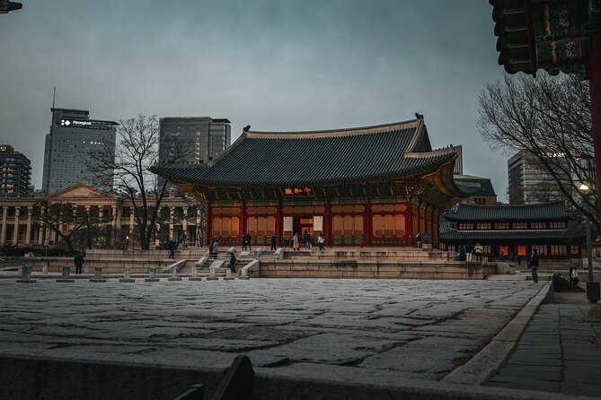 Seoul History Tour: Dark Past & Market Street Flavors - City Hall and Sungnyemun Gate: two views of Seoul