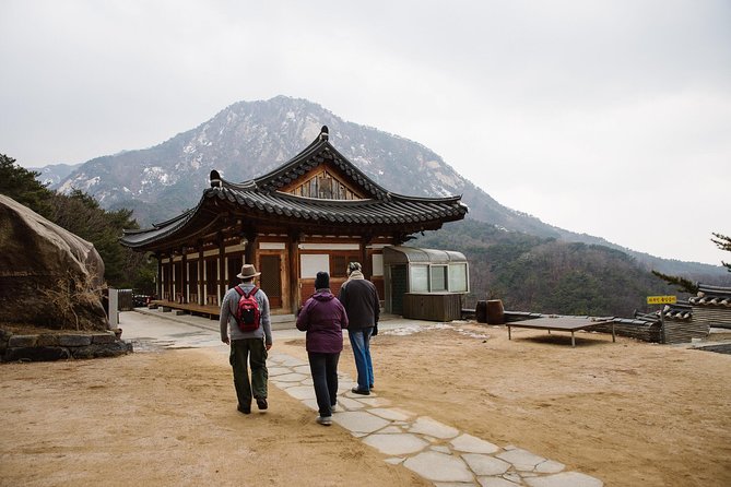 Seoul Mountain Hike: Temples, Folklore & Traditional Meal - The steep opening climb sets the pace